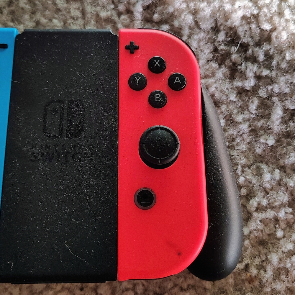 Nintendo Switch Red and Black Joy-Con Controller